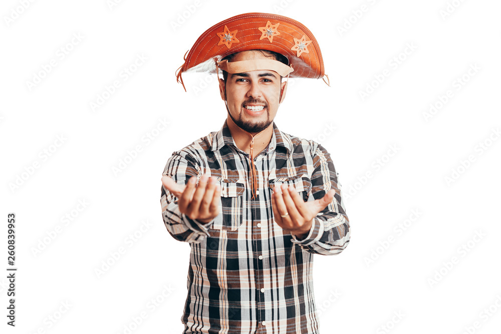 Brazilian man wearing traditional clothes for Festa Junina - June festival - isolated on white background Brazilian man wearing traditional clothes for Festa Junina - June festival - isolated on white background