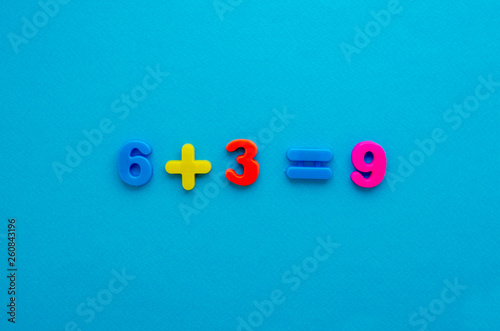 math action on blue paper background