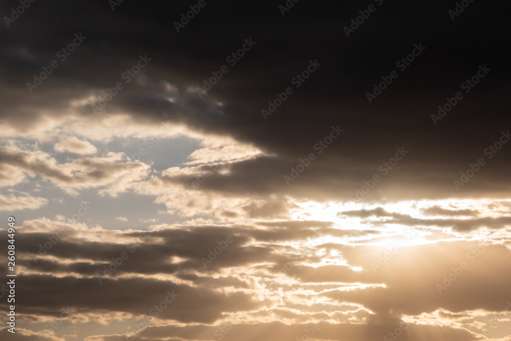 Clouds against the blue sky.