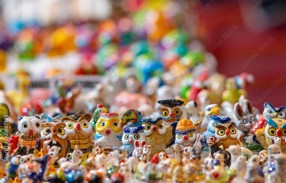 Fototapeta premium various owl figures to choose from on the counter