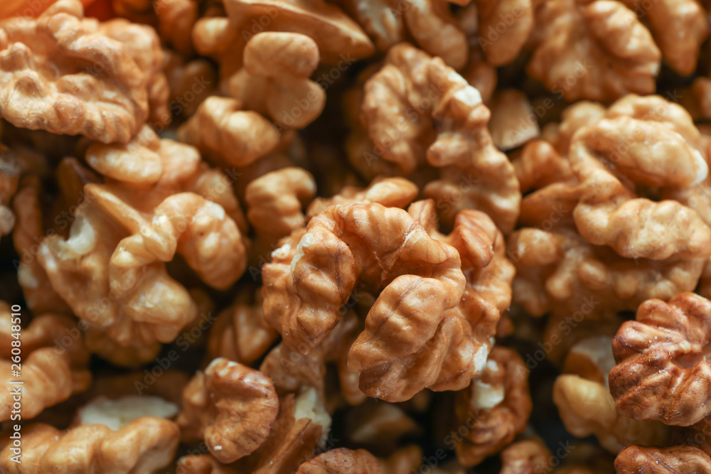 Delicious fresh walnuts kernels as background, closeup Delicious fresh walnuts kernels as background, closeup