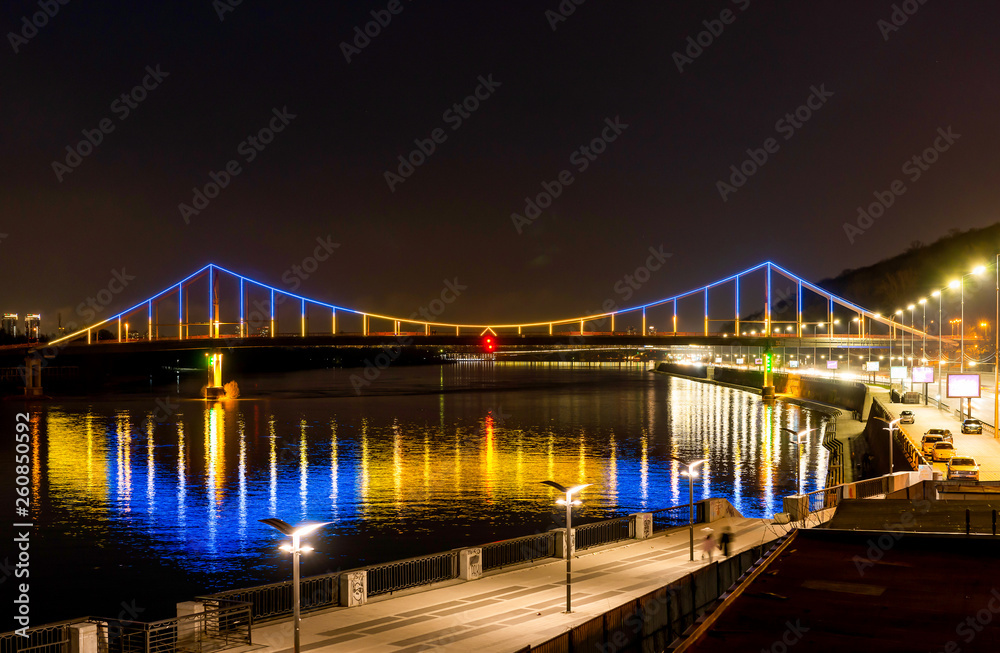 Bridge with blue and yellow light at night