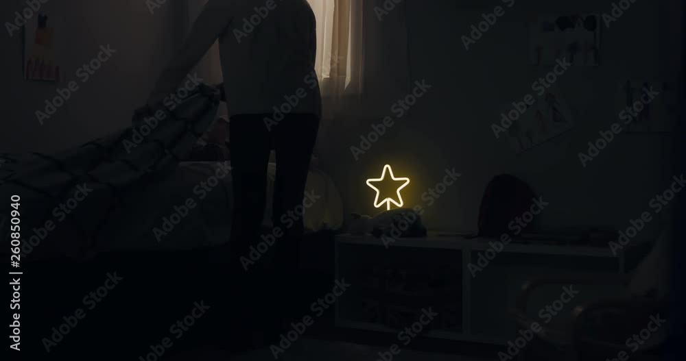 DOLLY IN MED Mom putting blanket on and stroking head for her little girl daughter on bed in a dark bedroom at night. 4K UHD RAW FOOTAGE DOLLY IN MED Mom putting blanket on and stroking head for her little girl daughter on bed in a dark bedroom at night. 4K UHD RAW FOOTAGE