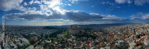 Aerial drone bird's eye view photo of iconic Acropolis hill, the Parthenon and famous theatre of Dionysus, Athens historic centre, Attica, Greece