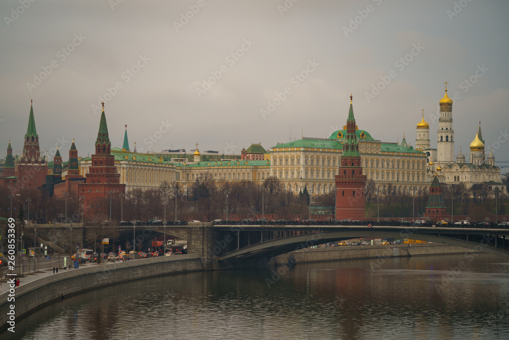 Moscow cityscape. Image of historical Moscow Kremlin in the spring day. Kremlin Towers, Residence of the President of the Russian Federation,  Ivan the Great Bell Tower and Bolshoy Kamenny Bridge over