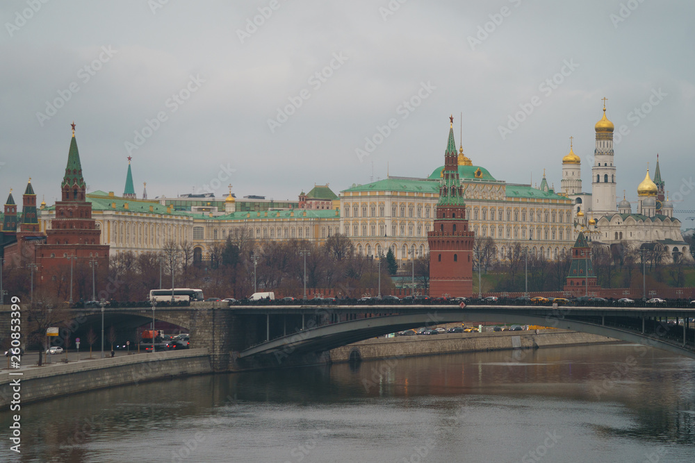 Moscow cityscape. Image of historical Moscow Kremlin in the spring day. Kremlin Towers, Residence of the President of the Russian Federation,  Ivan the Great Bell Tower and Bolshoy Kamenny Bridge over