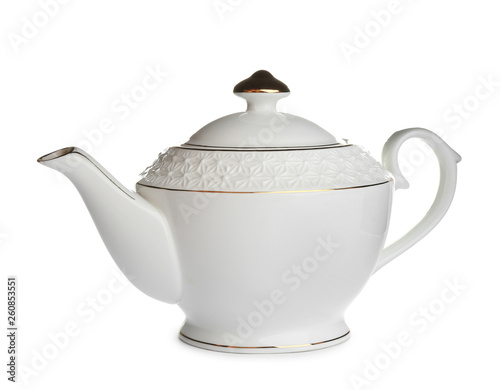 Porcelain teapot with decoration isolated on white photo