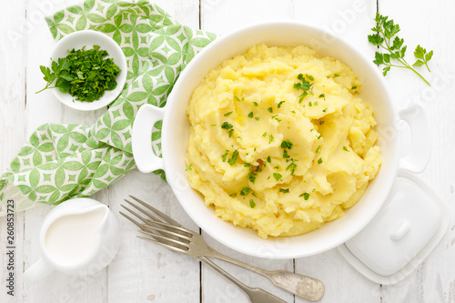 Photography Mashed potato with butter and milk on table