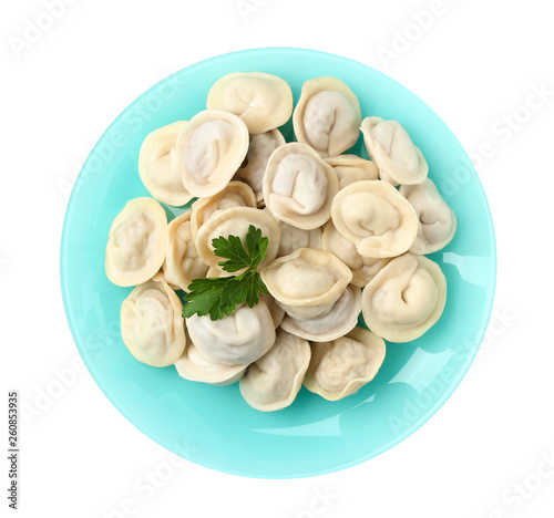 Plate with tasty dumplings isolated on white, top view