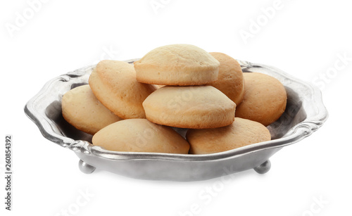 Dish with cookies for Islamic holidays isolated on white. Eid Mubarak