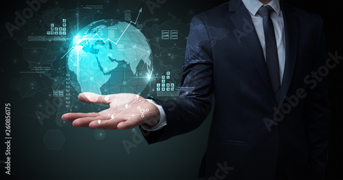 Wallpaper Mural Businessman handing transparent global information flow concept on his hand Torontodigital.ca