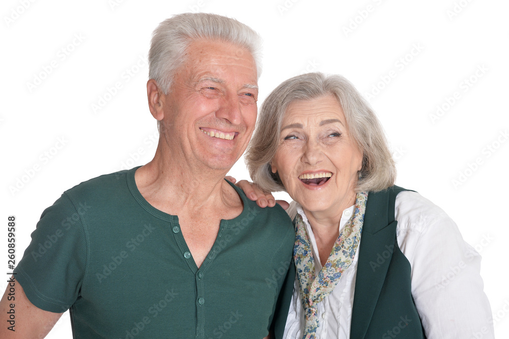 Happy senior couple posing on white background Happy senior couple posing on white background
