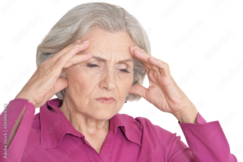 Close up portrait of senior woman with headache isolated on white background Close up portrait of senior woman with headache isolated on white background