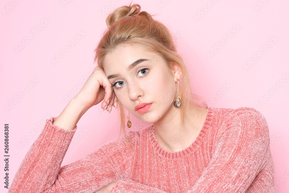 Beautiful young woman with make-up isolated on pink background. Beautiful young woman with make-up isolated on pink background.