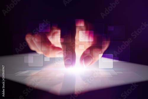 Slika na platnu Finger touching tablet with identification concept and dark background