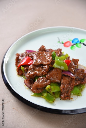 pork with rice and vegetables on white plate © WENYUE