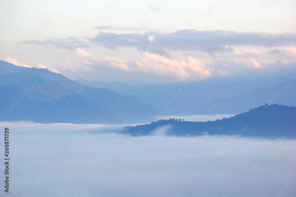 sea fog in the hills with beautiful sky background
