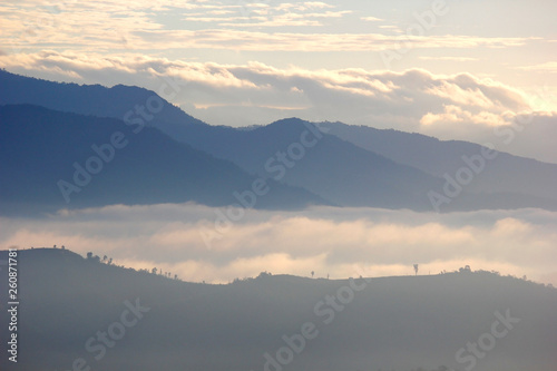 sea fog in the hills with beautiful sky background