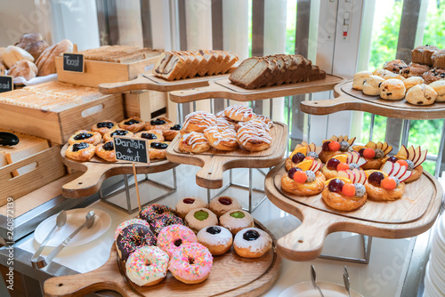 A variety of freshly made pastry in breakfast buffet at luxury hotel.
