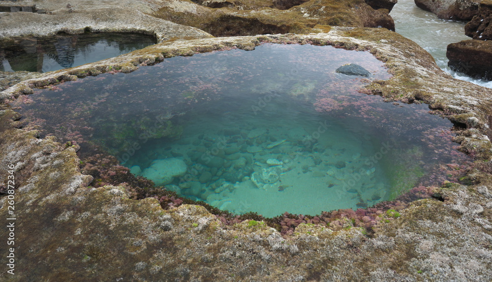 Heart-shaped tide pool at low tide at Akaogi district in Amami Oshima, Kagoshima, Japan