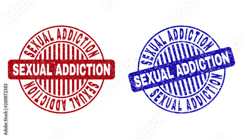 Grunge SEXUAL ADDICTION round stamp seals isolated on a white background. Round seals with distress texture in red and blue colors.