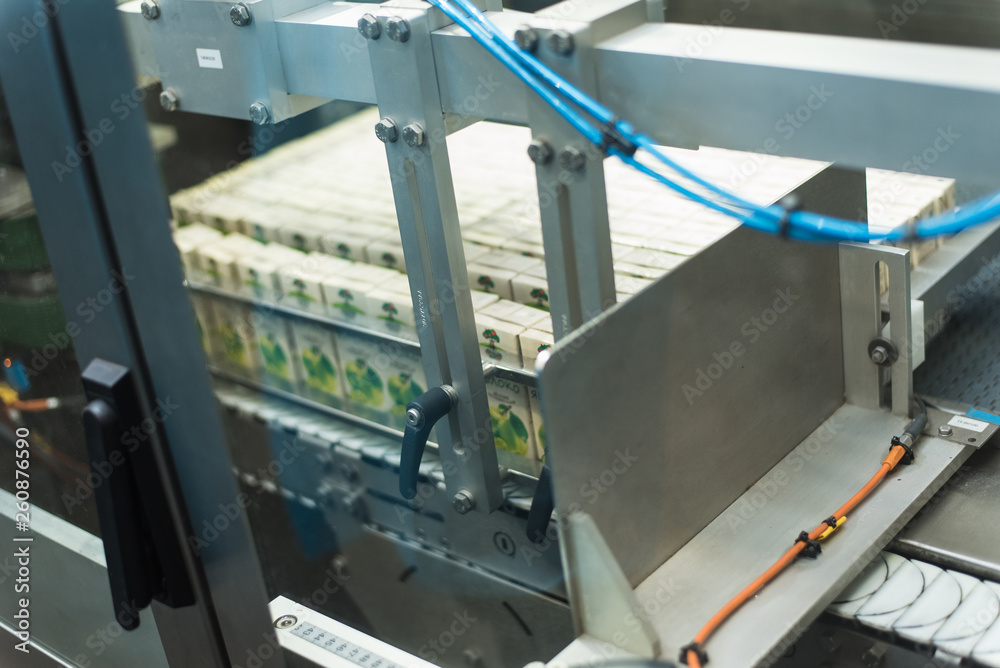production of juices in cardboard packaging. Industry, Metal Works production of juices in cardboard packaging. Industry, Metal Works