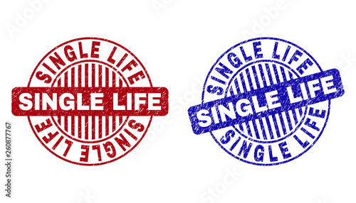 Grunge SINGLE LIFE round stamp seals isolated on a white background. Round seals with grunge texture in red and blue colors. Vector rubber imprint of SINGLE LIFE title inside circle form with stripes.