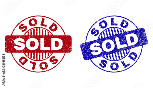 Grunge SOLD round stamp seals isolated on a white background. Round seals with distress texture in red and blue colors. Vector rubber overlay of SOLD label inside circle form with stripes.