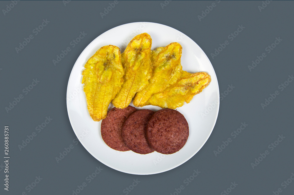 Frito con salami tostones Stock Photo | Adobe Stock