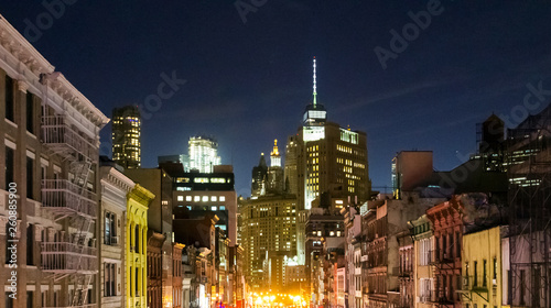 Canvas Print New York City skyline view at night of the buildings in lower Manhattan with col