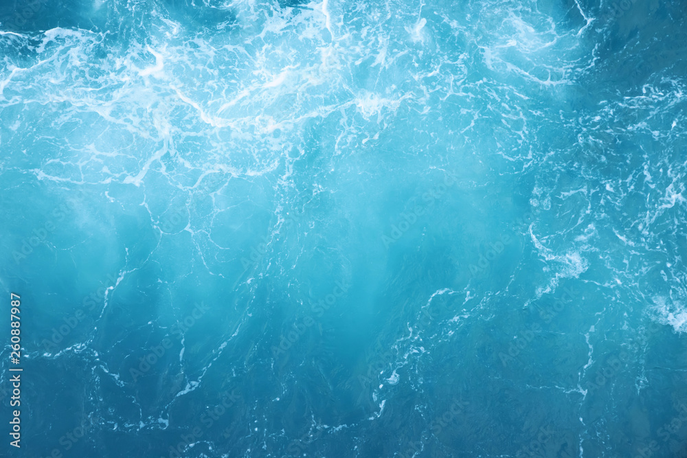 Sea  Waves in ocean wave Splashing Ripple Water. Blue water background.  