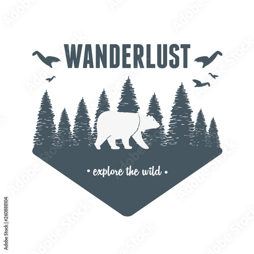 wanderlust label with forest scene and grizzly bear