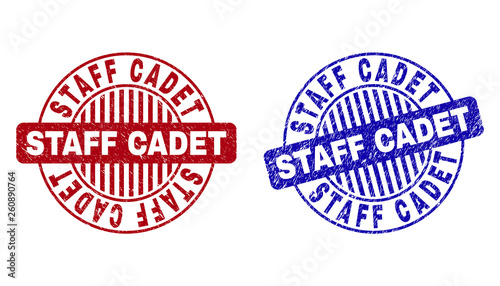 Grunge STAFF CADET round stamp seals isolated on a white background. Round seals with distress texture in red and blue colors.