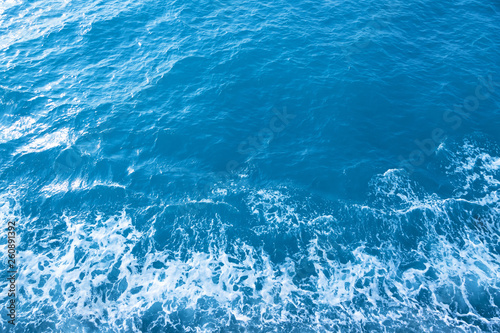 Sea Waves in ocean wave Splashing Ripple Water. Blue water background. 