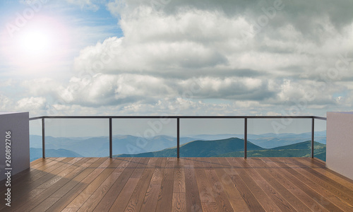 Balcony view of mountains. Landscape. Sunny Day. Terrace with a beautiful view. Background with beautiful landscape.
