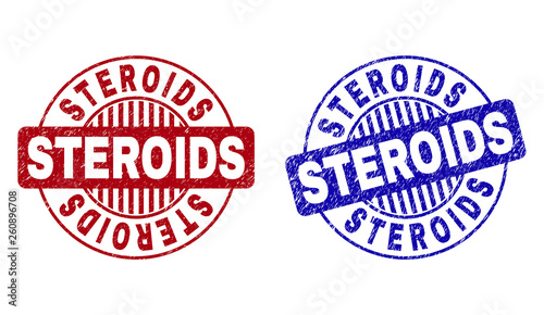 Grunge STEROIDS round stamp seals isolated on a white background. Round seals with grunge texture in red and blue colors. Vector rubber imprint of STEROIDS label inside circle form with stripes.