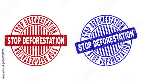 Grunge STOP DEFORESTATION round stamp seals isolated on a white background. Round seals with grunge texture in red and blue colors.