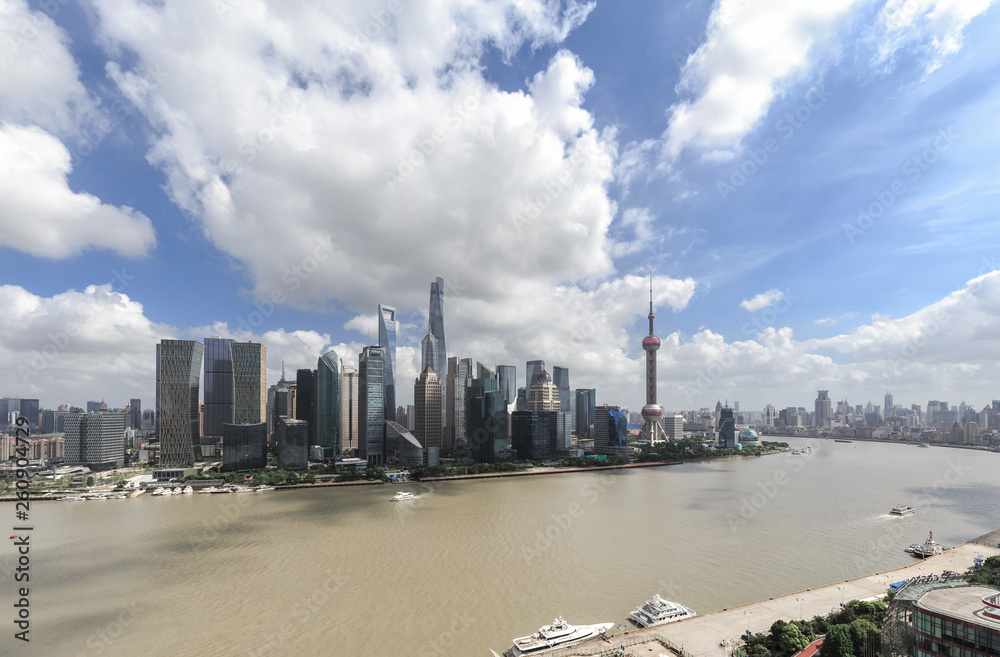 Aerial View of Shanghai cityscape and skyline with cloudy sky	