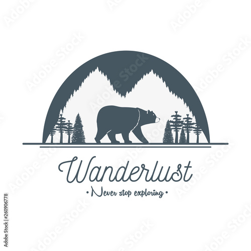 wanderlust label with forest scene and grizzly bear