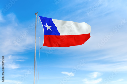 Chile flag over blue sky background
