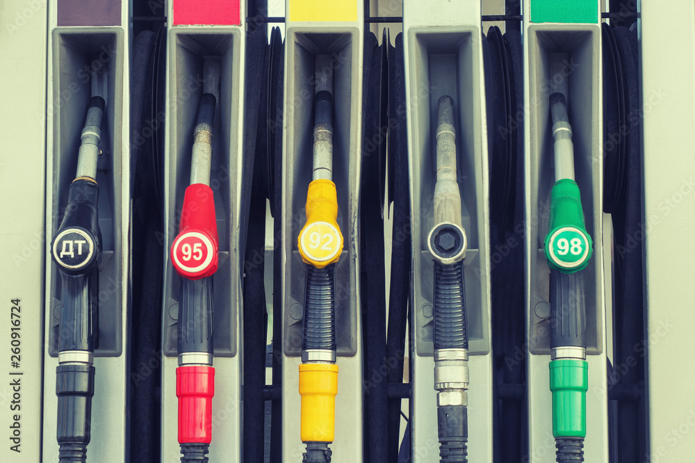 fuel dispensing nozzles at the gas station