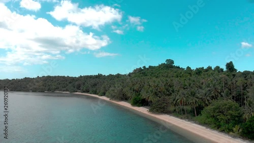 Flight over beautiful empty beach