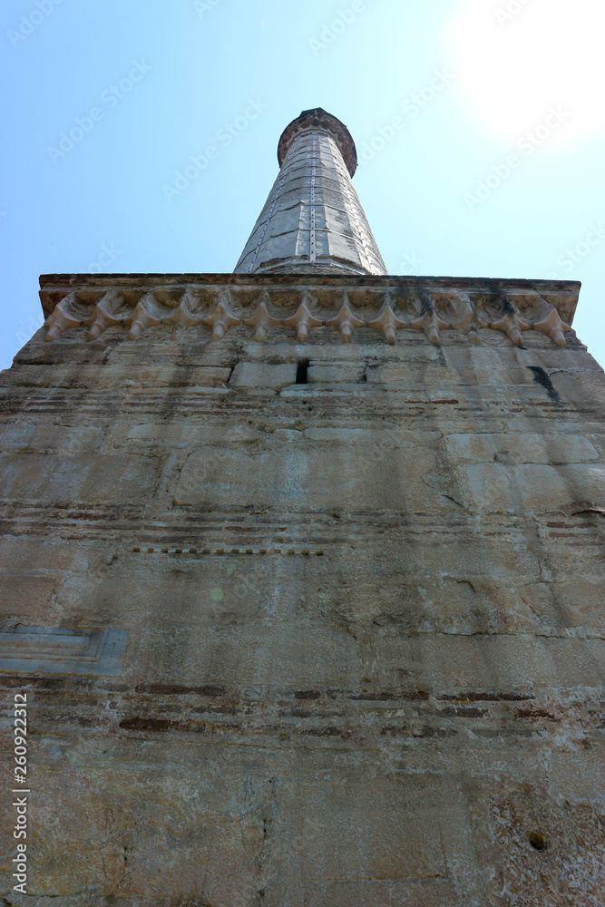 view from below to medieval minaret near rotunda of galerius in Thessaloniki, Greece