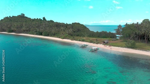 Flight over beautiful empty beach