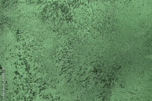 beautiful vintage green rough painted metallic surface texture for use as background.