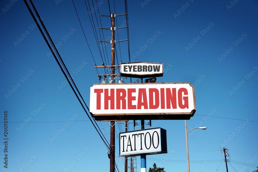 aged eyebrow threading and tattoo sign aged eyebrow threading and tattoo sign