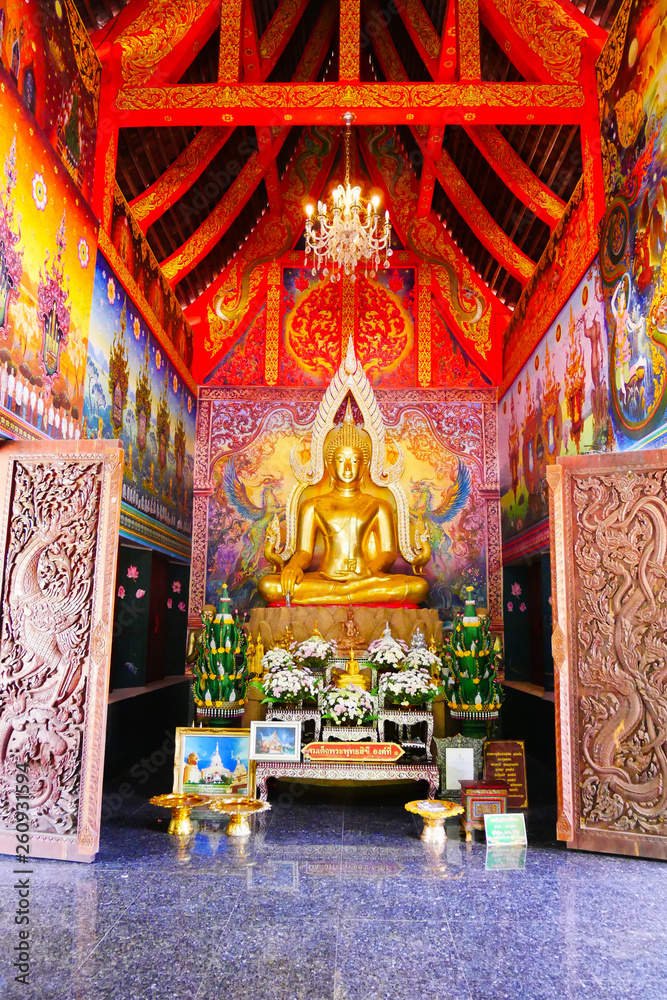 Buddha statue in Phutthanimit Bureau of Monks, the Thai  traditional and public temple in contry side of Nakhon Phanom Province and Tha Uthen District in Thailand