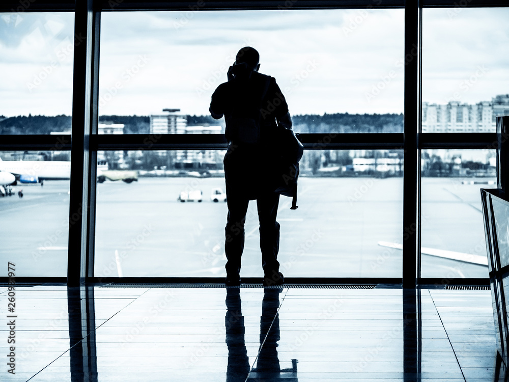 Fototapeta premium Phone call from an airport