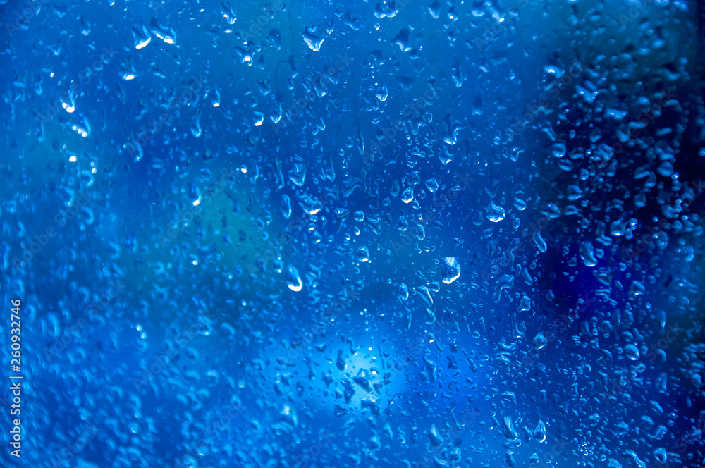 dark blue Texture Raindrops on window glass for rain, photo, blurred background, drizzle dark blue Texture Raindrops on window glass for rain, photo, blurred background, drizzle