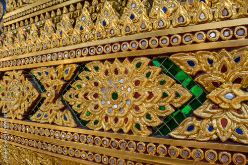 Ancient golden carving at Phra Phutthabat Temple Thailand photo